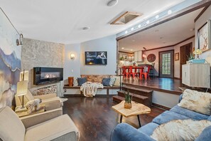 Smart TV, fireplace, video games, table football