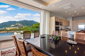 Dining - Upscale oceanfront condo with extensive balcony, pool & ocean views (Puerto Vallarta)