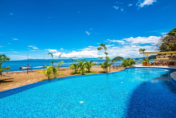 A heated pool - Upscale oceanfront condo with extensive balcony, pool & ocean views (Puerto Vallarta)
