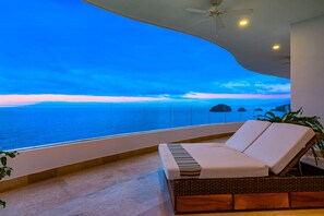Terrace/patio - Upscale oceanfront condo with extensive balcony, pool & ocean views (Puerto Vallarta)