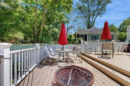 Dog-friendly home with firepit, large deck & yard - close to town