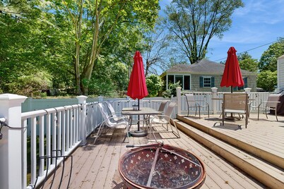 Dog-friendly home with firepit, large deck & yard - close to town