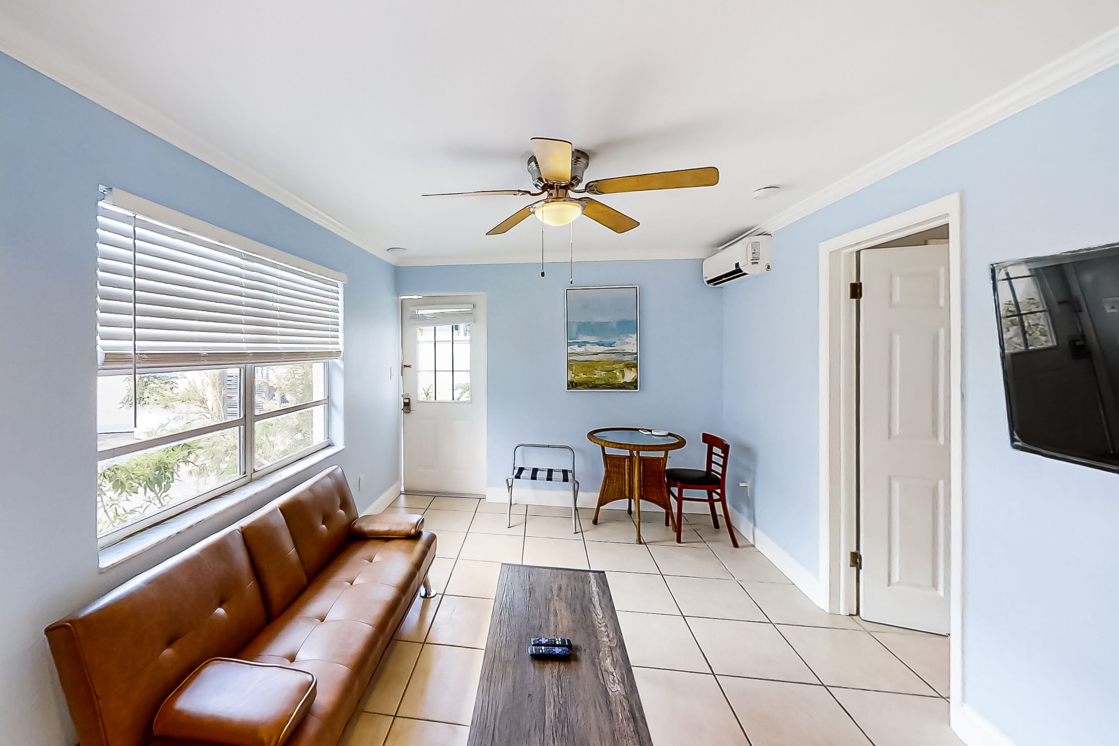 Airy condo with dock, outdoor pool, W/D, kitchenette, AC, & streaming