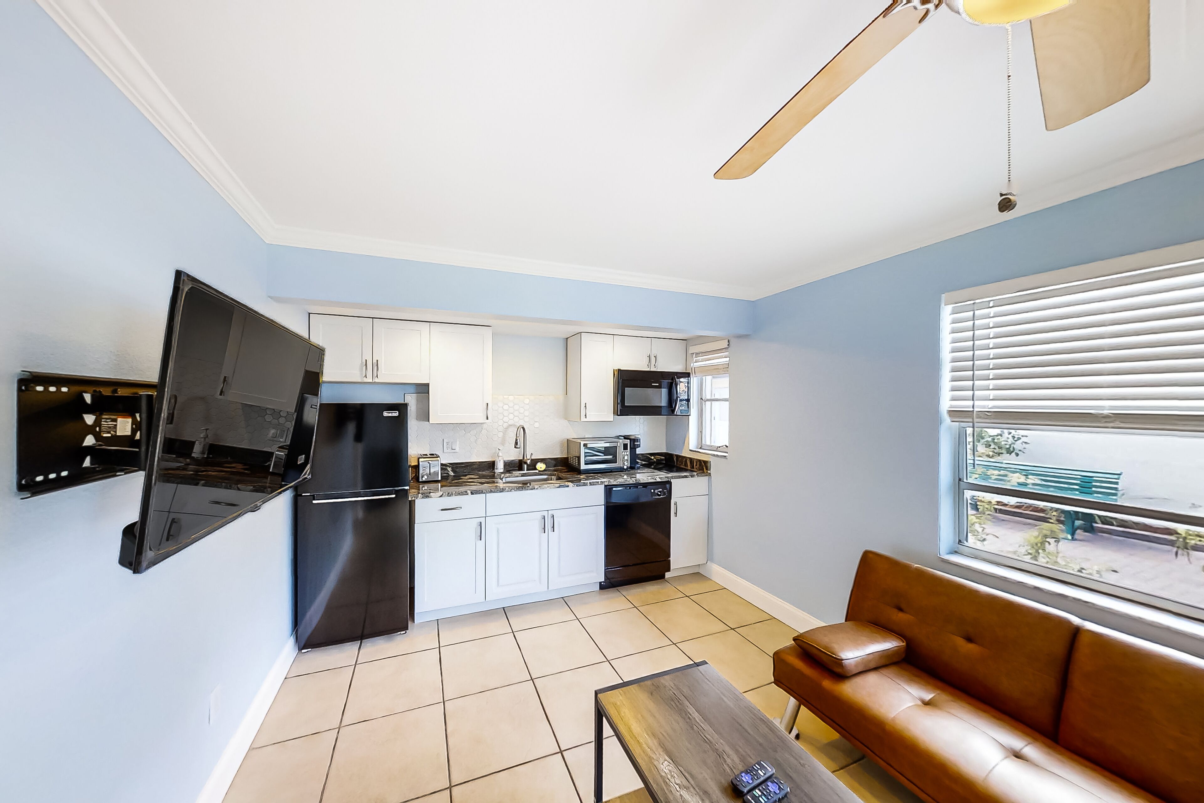 Airy condo with dock, outdoor pool, W/D, kitchenette, AC, & streaming