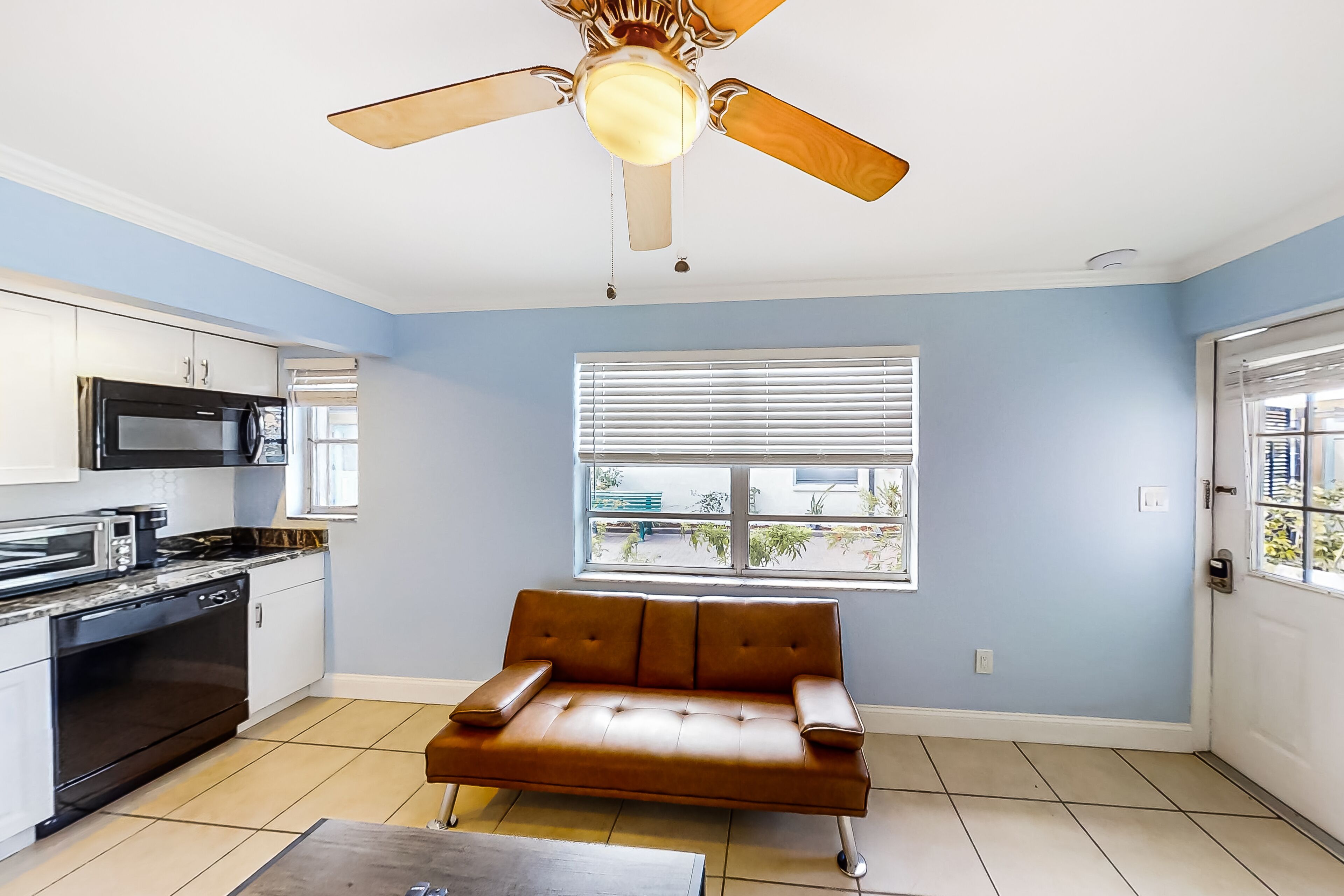 Airy condo with dock, outdoor pool, W/D, kitchenette, AC, & streaming