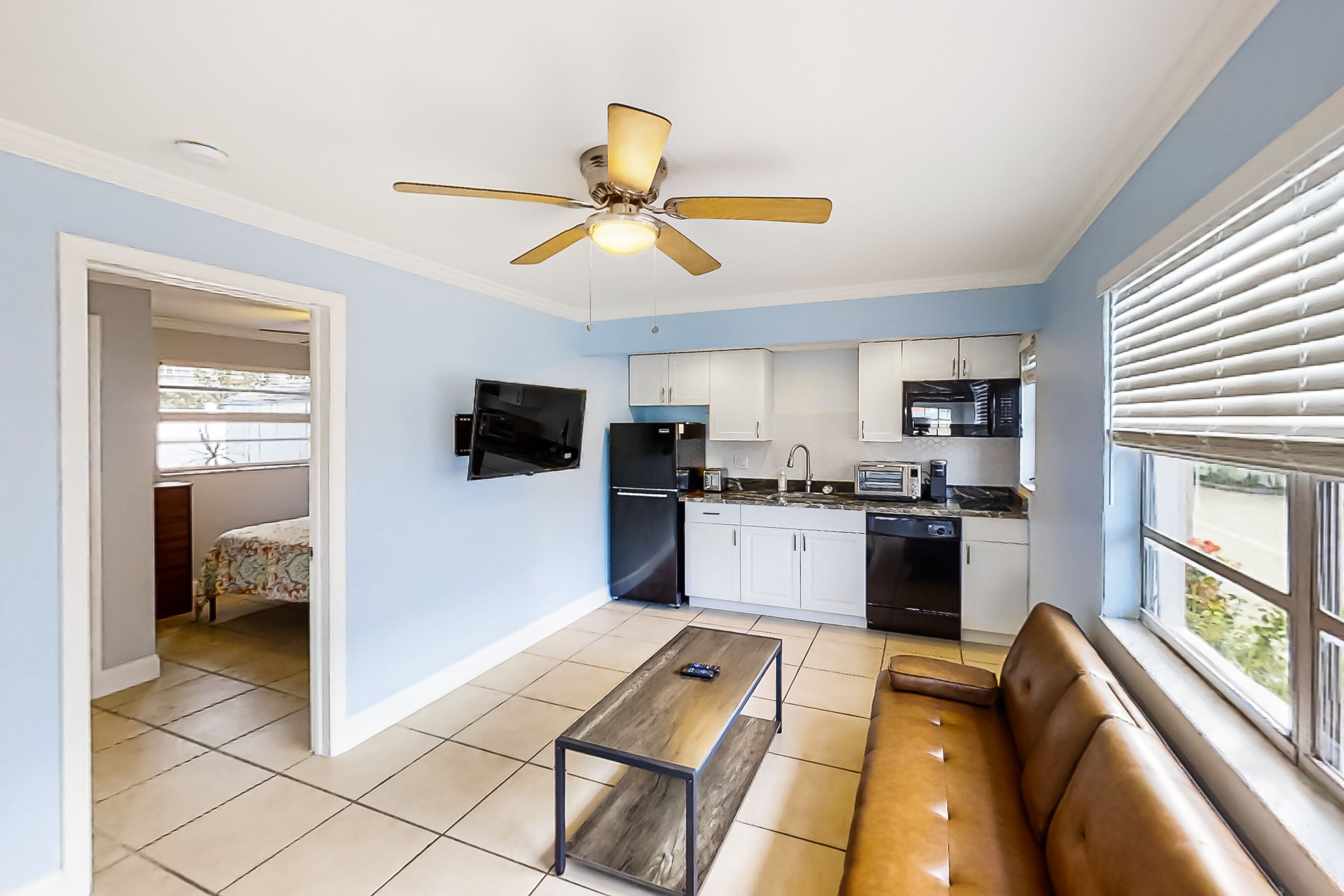 Airy condo with dock, outdoor pool, W/D, kitchenette, AC, & streaming