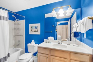 Enjoy a refreshing bath in the bathtub, or get ready for the day with the sink and mirror.