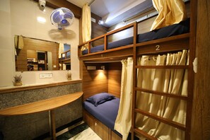 A bunk bed room with a desk and a mirror. - MAPLE THE HUBZ-Hostel (Mumbai)