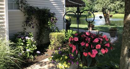 Eastern Long Island gated community condo on a pond with resort style pool