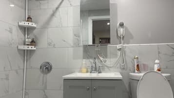 Hair dryer, towels, soap, shampoo