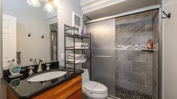 Shower, hair dryer, towels, soap