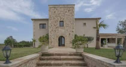 Villa with pool in front of Es Trenc
