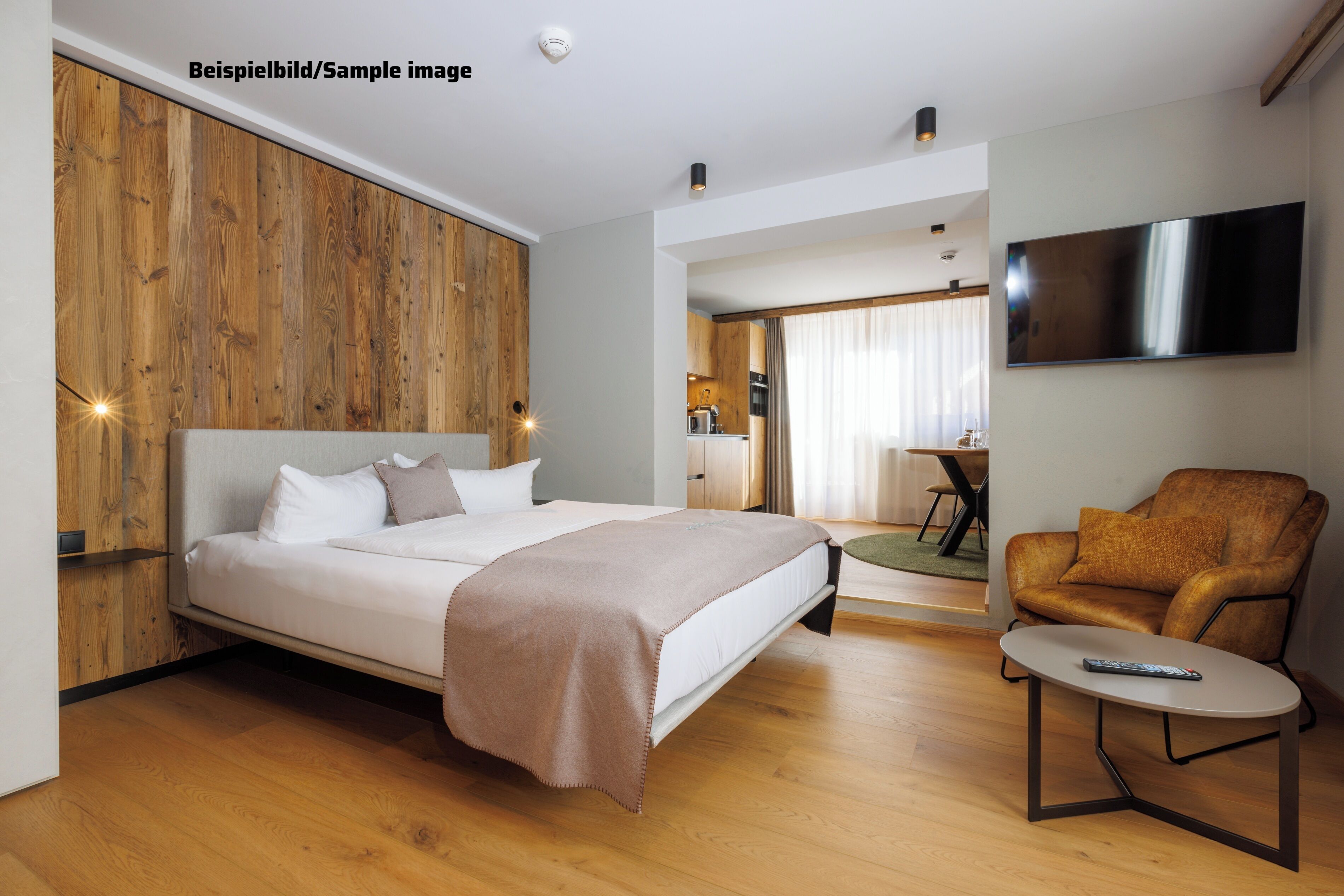 Design Studio | Living area | 95-cm flat-screen TV with cable channels