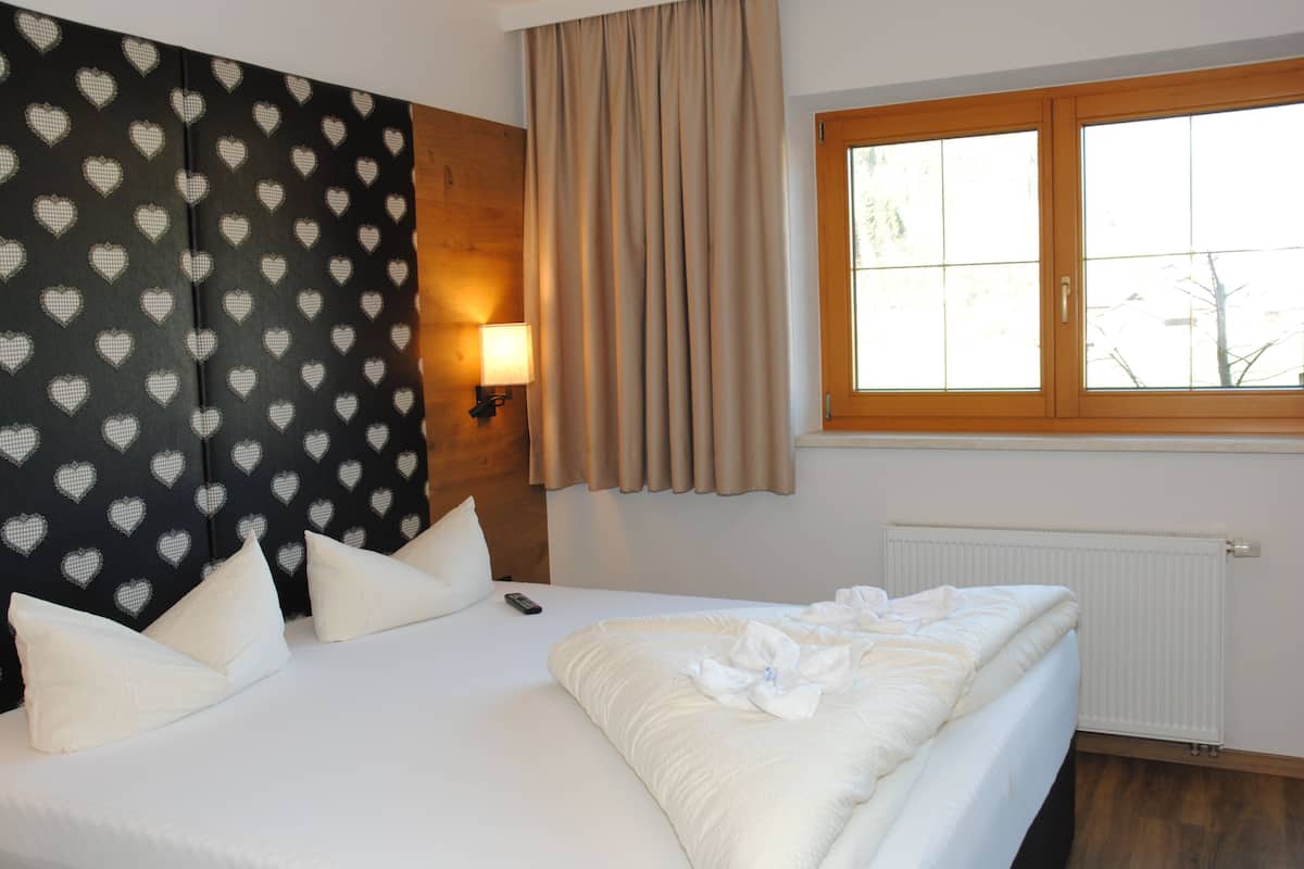 Deluxe appartement, 1 slaapkamer, 2 badkamers | 2 slaapkamers, verduisterende gordijnen, gratis wifi, beddengoed