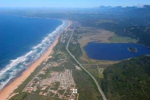 Overlooking the coastline, this property offers stunning views of the ocean and surrounding landscape.