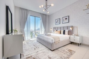 2 chambres, coffres-forts dans les chambres, fer et planche à repasser