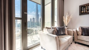 Living area - Elegant 2BR at Downtown Views Downtown Dubai by Deluxe Holiday Homes (Dubai)