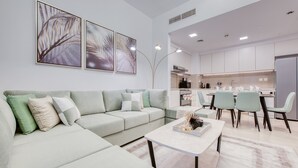 Living area - Exquisite 2BR at Zahra Breeze Dubailand by Deluxe Holiday Homes (Dubai)