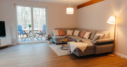 Vacation apartment in the middle of the forest on Ratzeburger Küchensee and terrace (5*star DTV)
