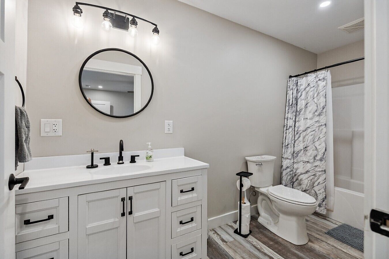 Combined shower/tub, hair dryer