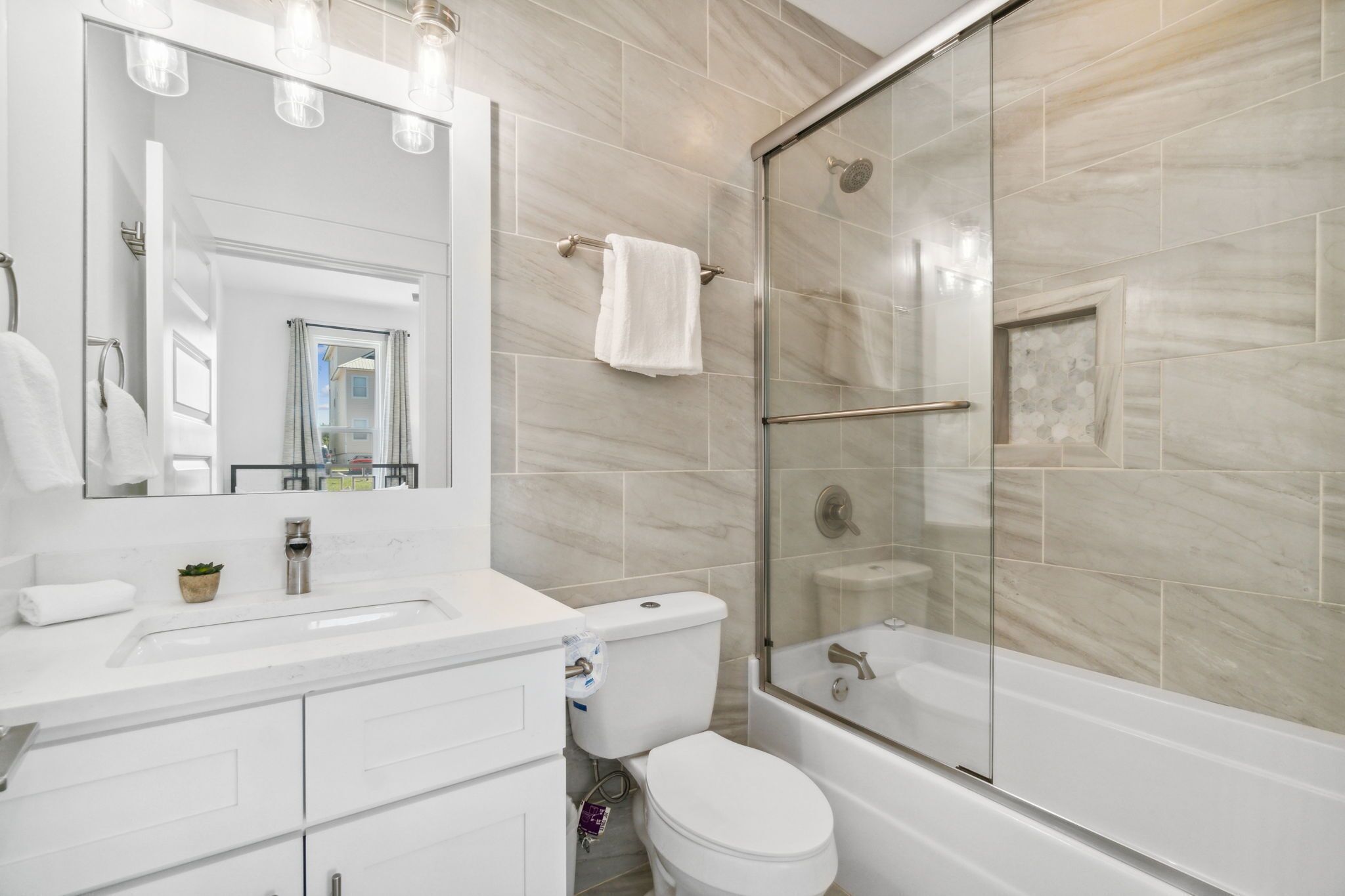 Private saltwater pool and less than a 2-minute walk to the beach in Seacrest!