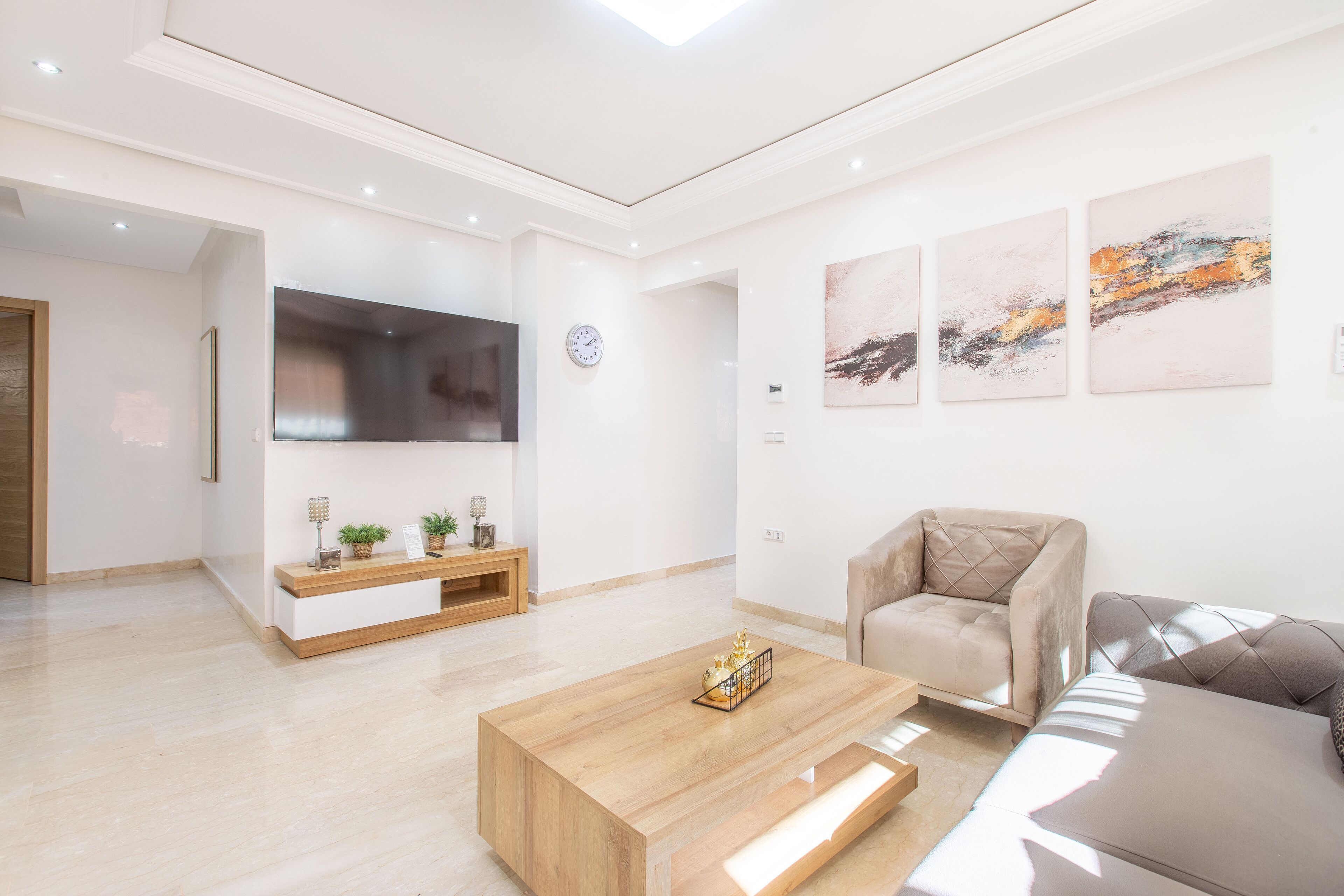 Deluxe Apartment, 2 Bedrooms, Balcony | Living area | 65-inch Smart TV with digital channels, TV, Netflix