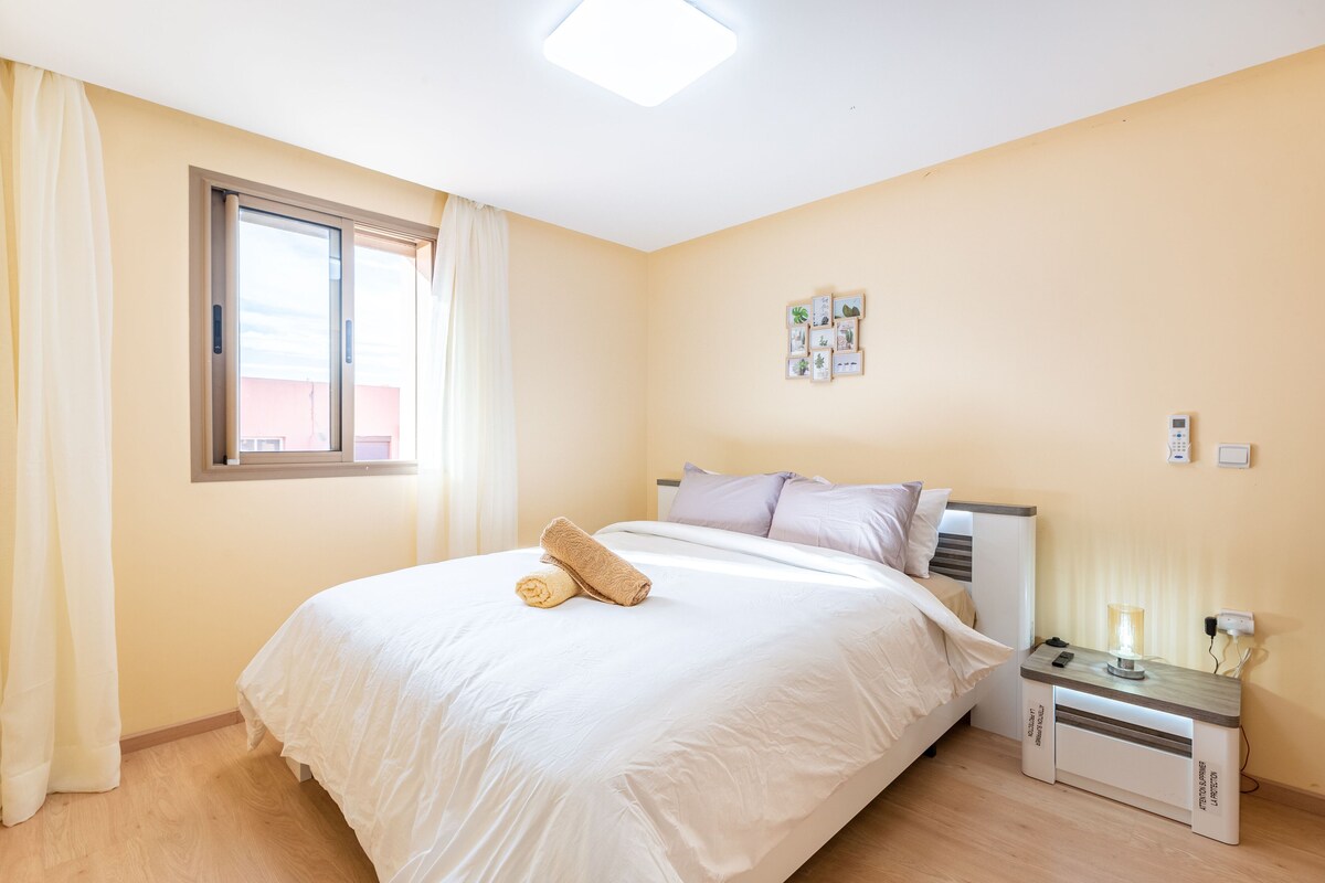 Deluxe-Apartment, 2 Schlafzimmer | Bettwäsche aus ägyptischer Baumwolle, hochwertige Bettwaren