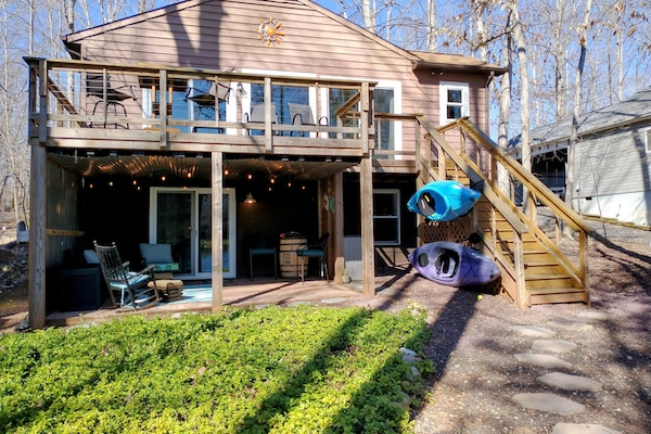 Deck and porch overlooking the lakefront.