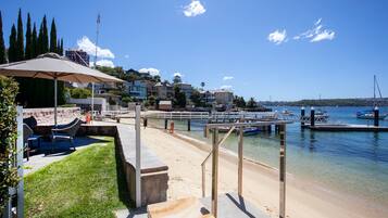 On the beach, sun-loungers, beach towels