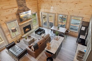 TV, fireplace - A Pine Choice is a Newly Built 2 Bedroom Luxury Cabin Minutes from Gatlinburg and Pigeon Forge! (Sevierville)