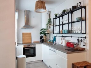 Fridge, coffee/tea maker, electric kettle, toaster