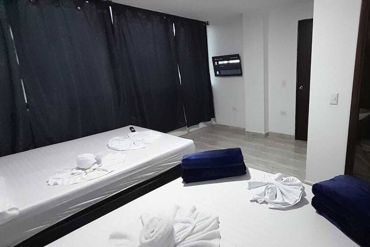 Premium bedding, down comforters, Tempur-Pedic beds, iron/ironing board