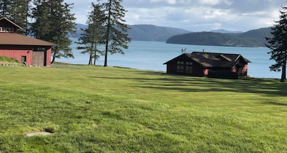Beautiful farmhouse overlooking water with beach access on a private estate