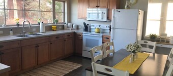 Beautiful farmhouse overlooking water with beach access on a private estate