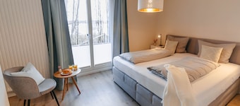 Vacation apartment between forest and lake with two terraces