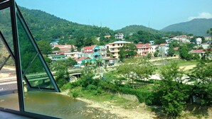 A view of a town with houses and a river.
