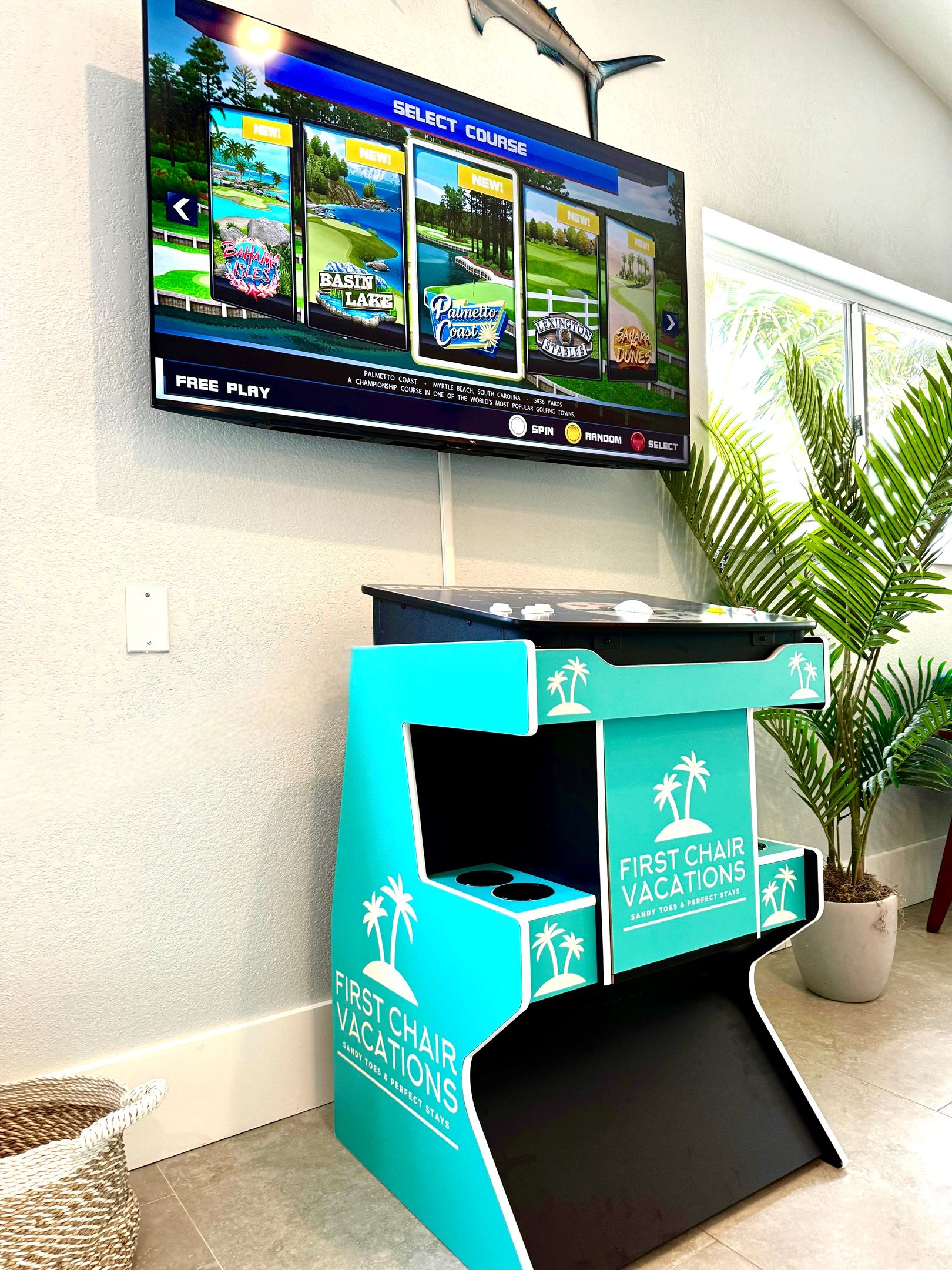 A slot machine with a screen displaying various golf courses.