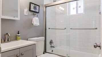 Bathtub, hair dryer, towels