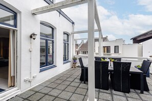 Enjoy a balcony with a table and chairs, perfect for taking in the views.