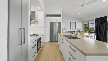 Coffee/tea maker, fridge, microwave, oven