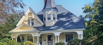 Dog-friendly historical home with gorgeous porch & prime in-town location