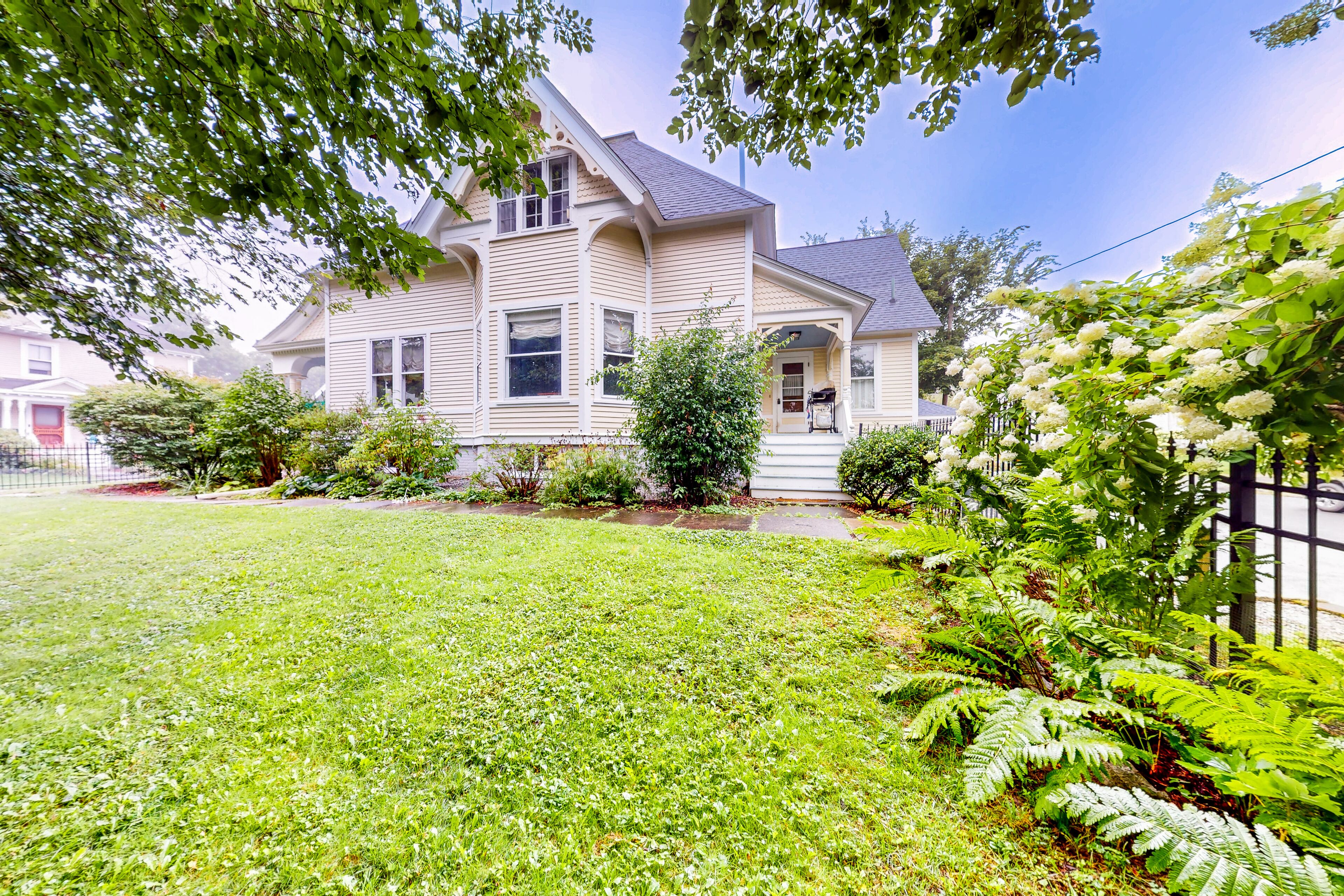 Dog-friendly historical home with gorgeous porch & prime in-town location