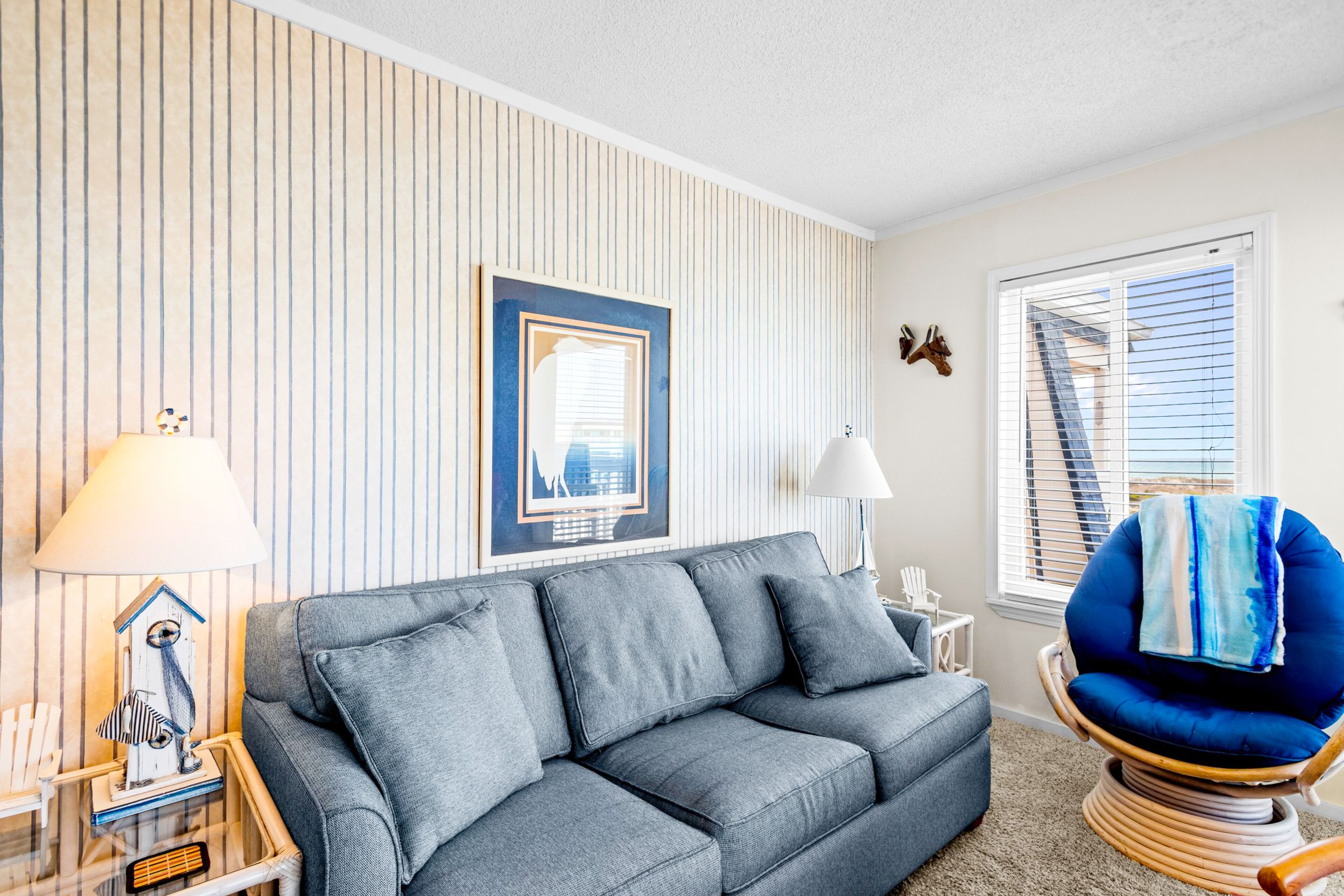 Ocean-view condo with beach access, pool, sports courts, & private balcony