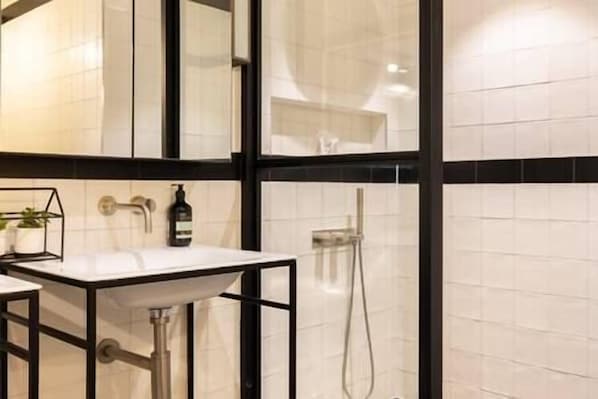 Hair dryer, towels, soap, toilet paper