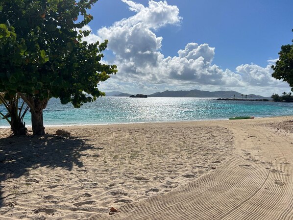 On the beach, sun-loungers, beach towels