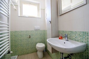 Douche, sĂšche-cheveux
