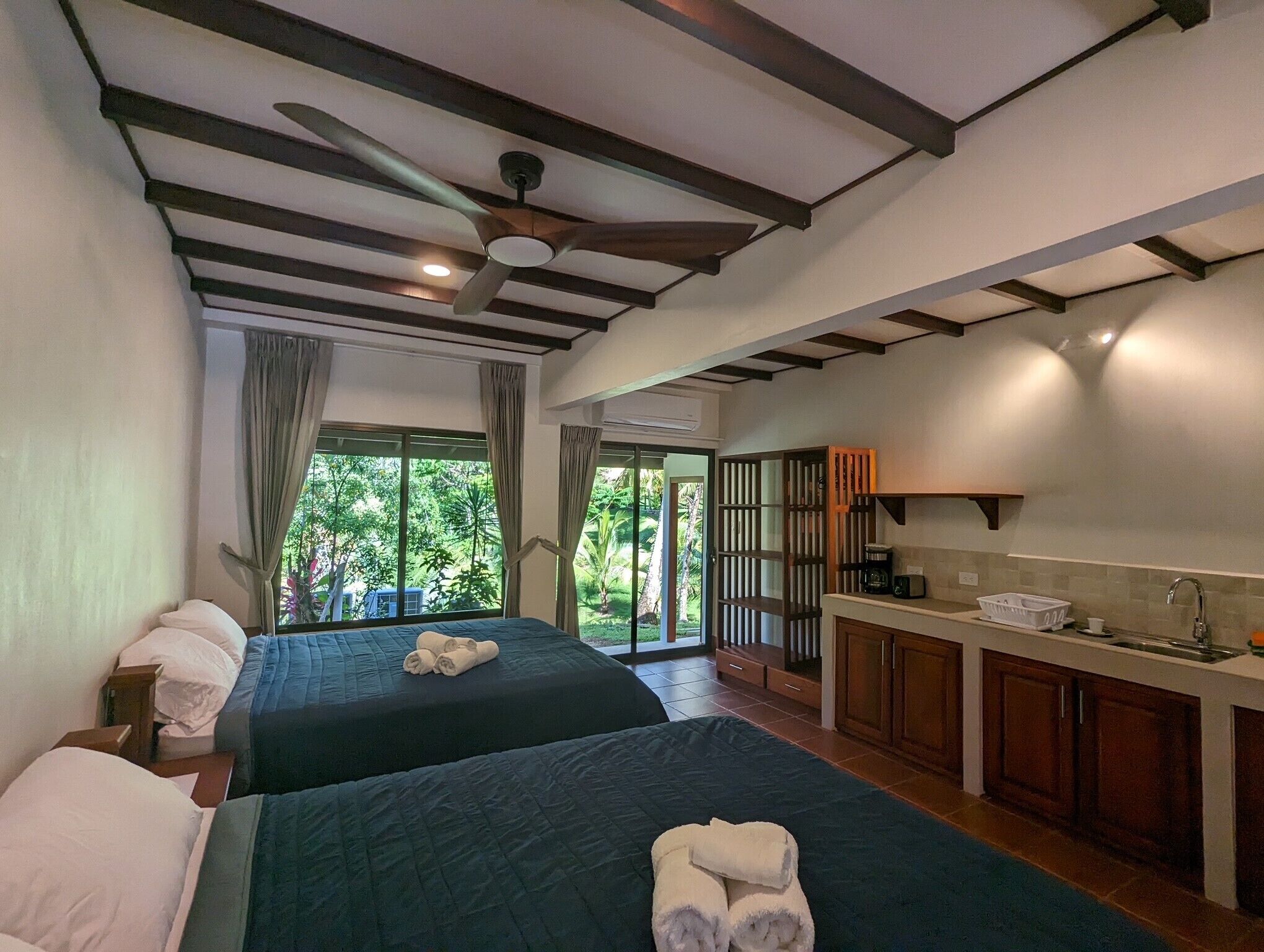 Basic Quadruple Room, 2 Queen Beds, Non Smoking, Garden View | In-room safe, blackout drapes, free WiFi, bed sheets