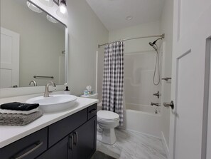 Hair dryer, towels, soap, toilet paper
