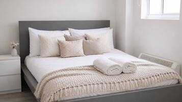 Iron/ironing board, travel crib, WiFi, bed sheets