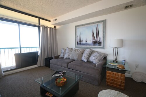 Enjoy Sunrise and dolphin's swimming every morning from your personal balcony!